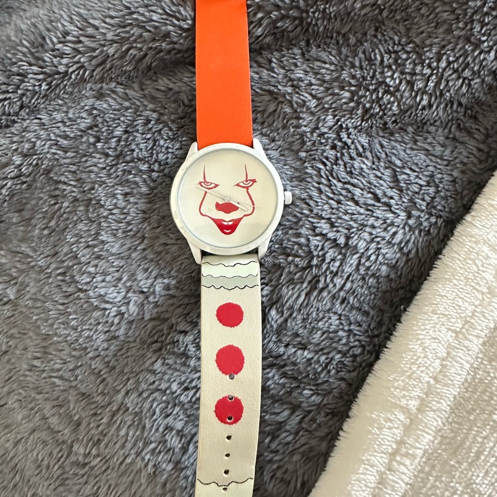 Pennywise watch, never worn. Orange and White Novelty Watch